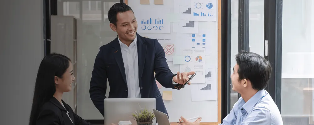 Business owners discussing how to optimize their operations
